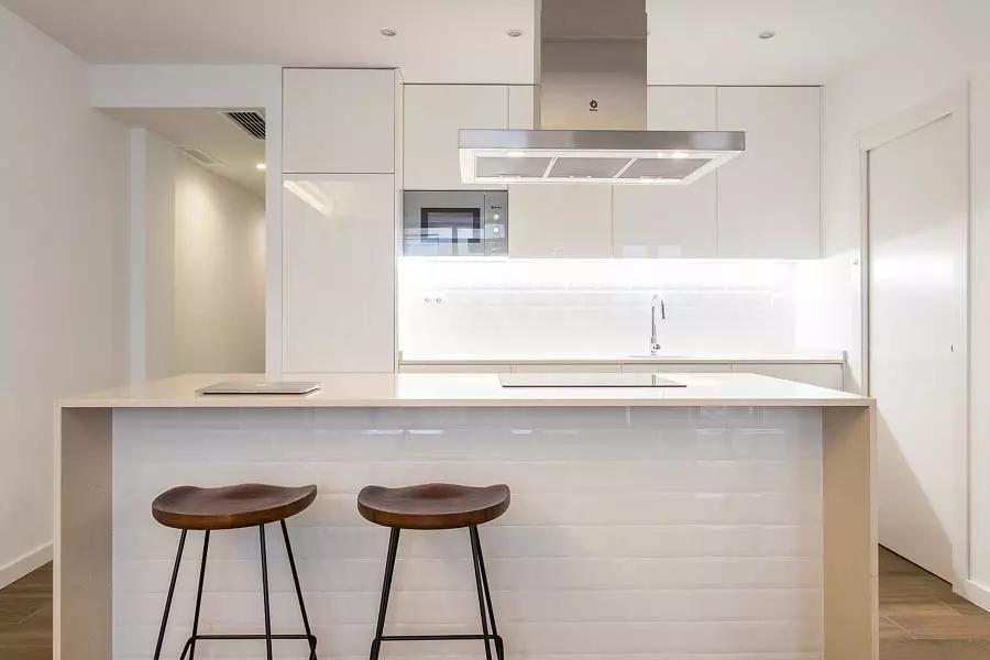 white kitchen with recessed light